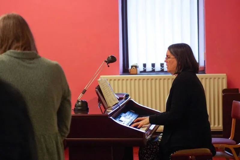 The organist playing during a service